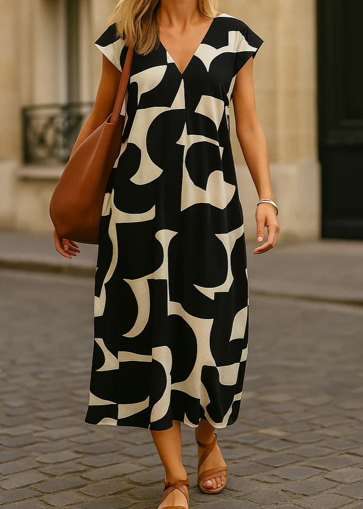 Jeanne ~ La robe à encolure en V qui dégage un charme naturel